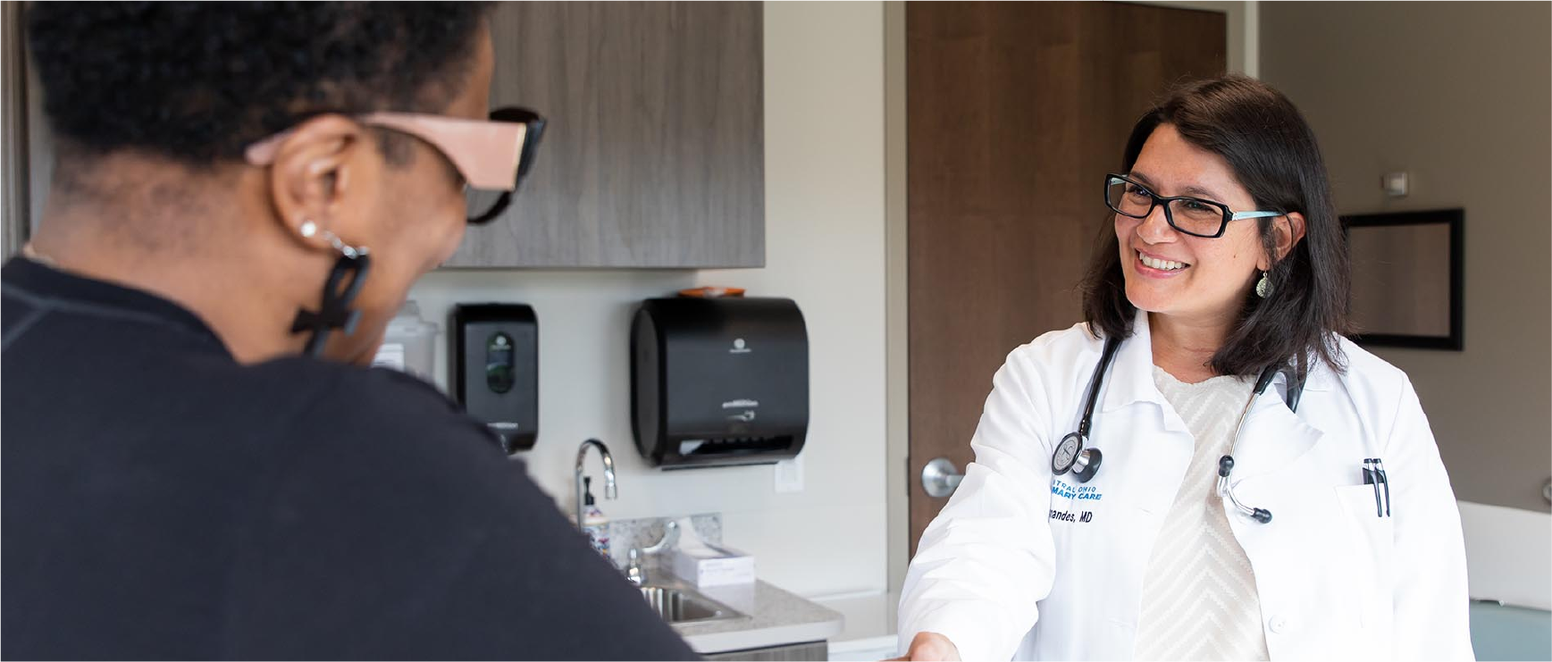 primary-care-doctor-greeting-patient