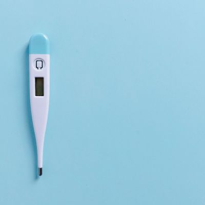 thermometer-on-blue-background