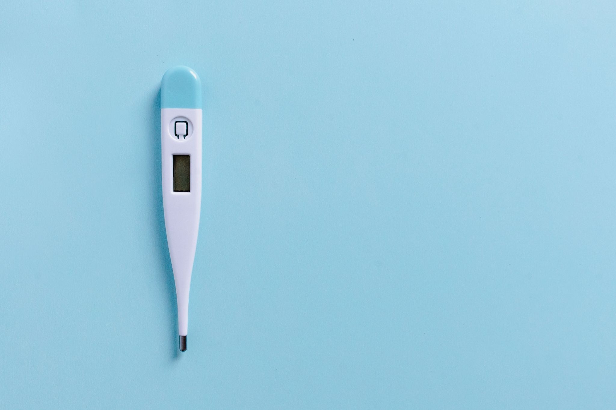 thermometer-on-blue-background